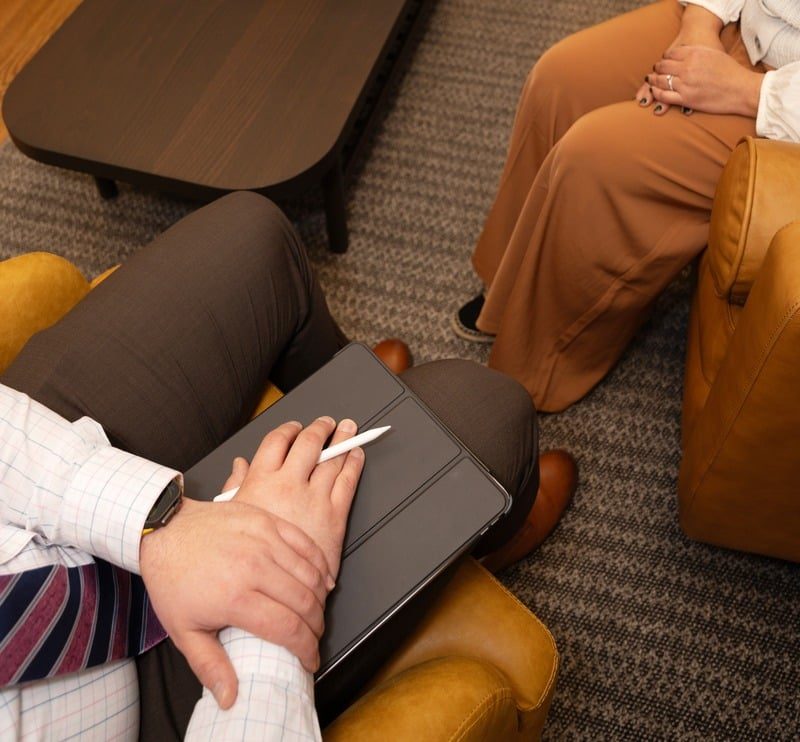 Clinician reviewing a care plan during a consultation
